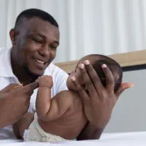 person holding a baby