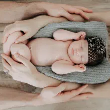 Newborn baby in crochet hat