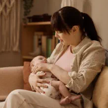 Mother holding her baby