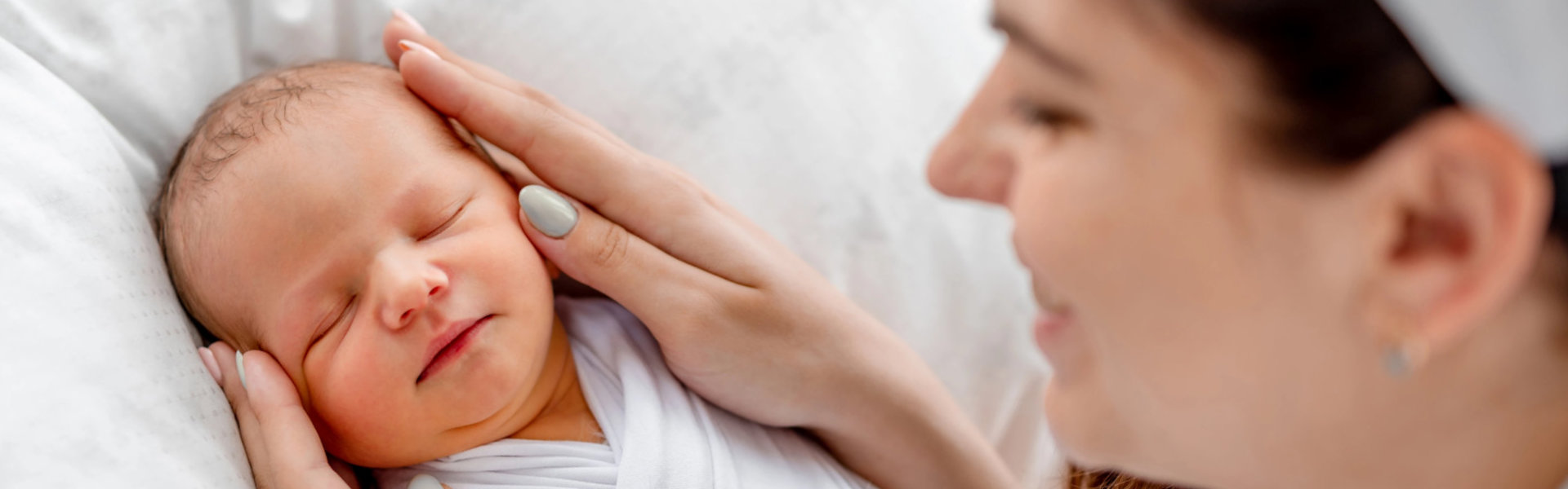 Mother holding newborn baby