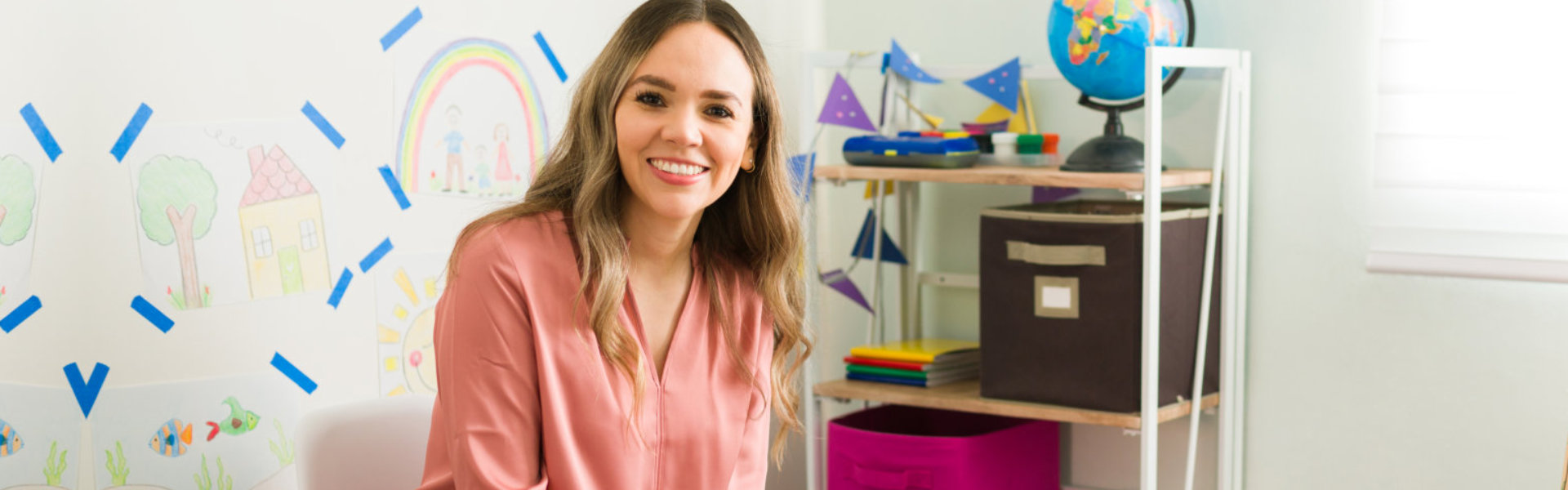 Smiling woman in a classroom