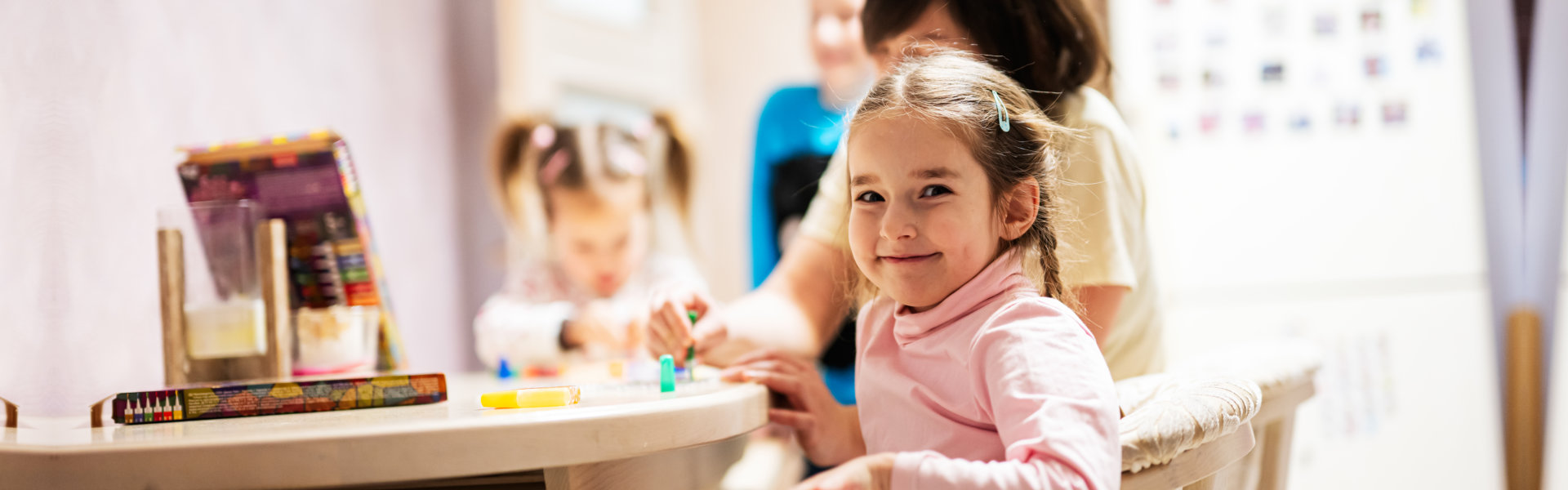 Little girl smiling at camera