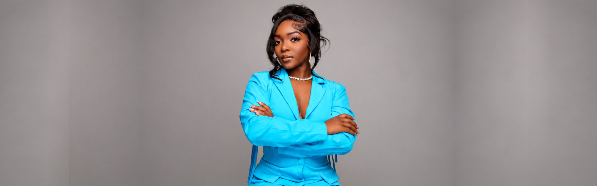 Confident woman in blue suit